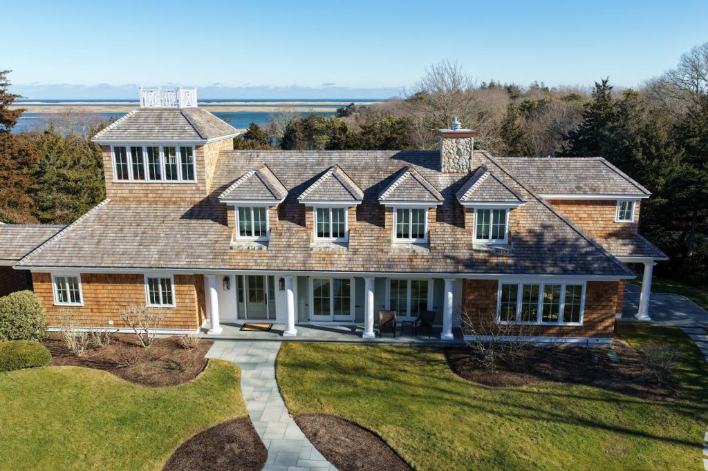 Orleans oceanfront home with cedar roof and white cedar facade